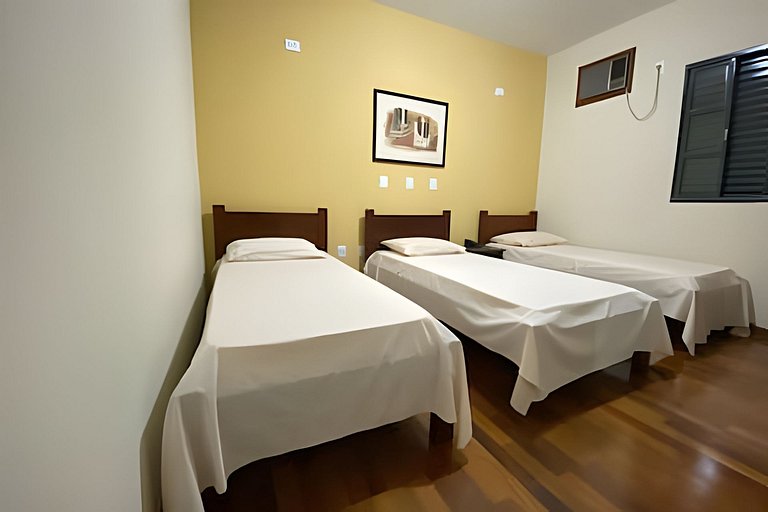 Suíte 102/Recepção/1 Cama de Casal/Ar